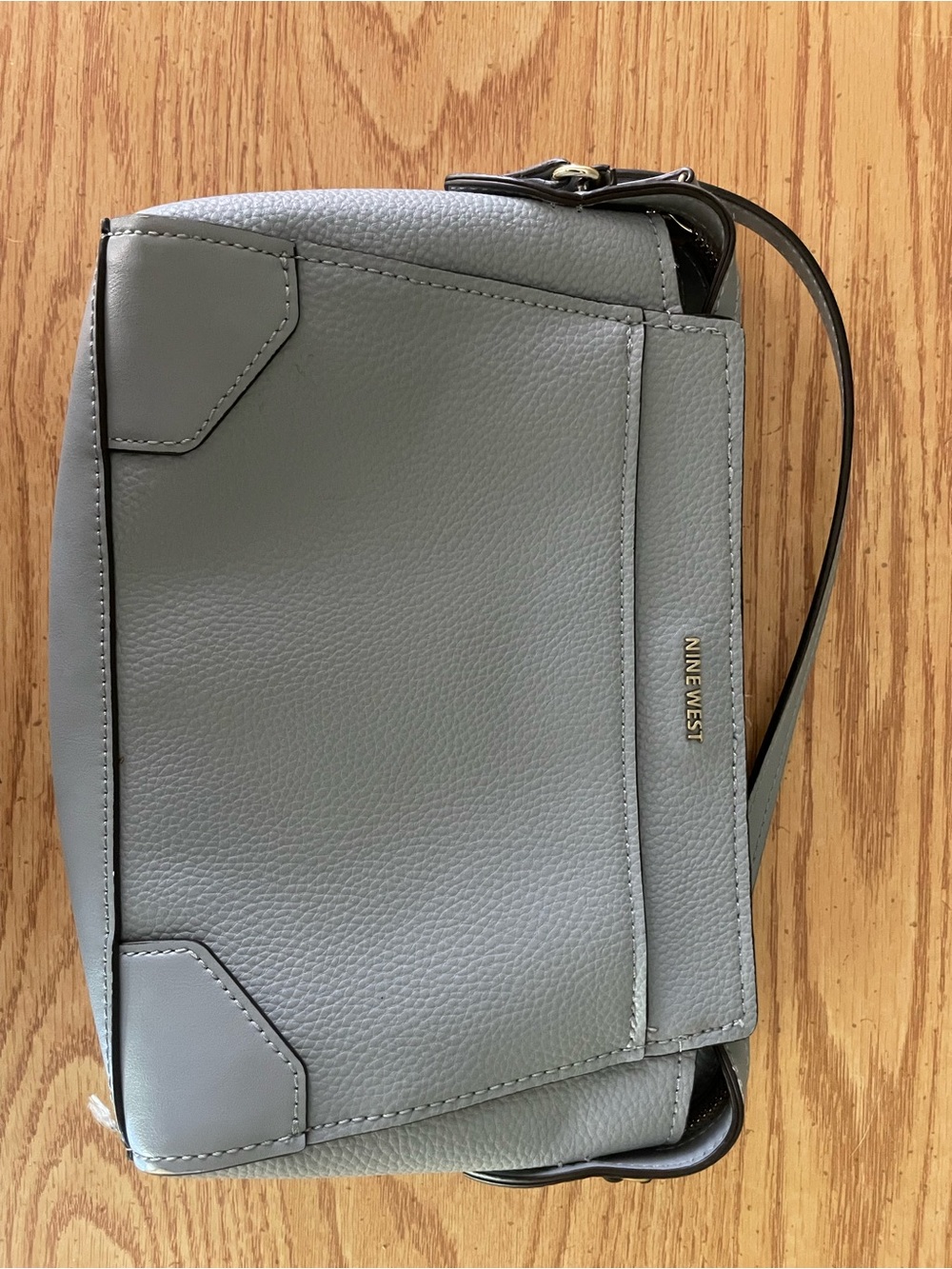 Nine West Light Gray Pebbled Crossbody Bag with Gold Logo